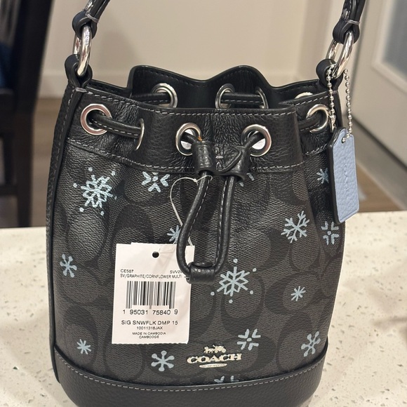 Coach Dempsey Drawstring Bucket Bag Black Signature Canvas With Snowflake Print - Picture 1 of 8